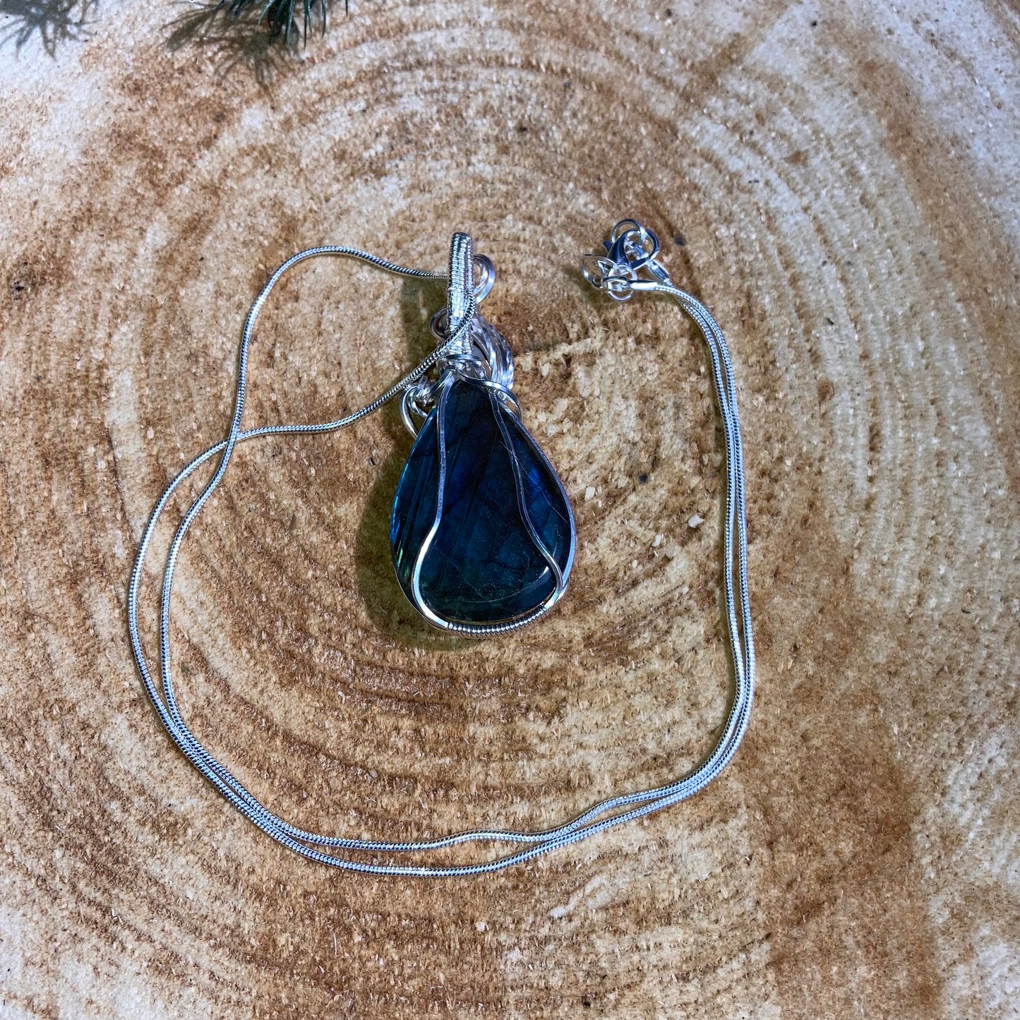 Blue flash Labradorite Rainbow Moonstone wrapped in 925 sterling silver on a 925 sterling silver chain