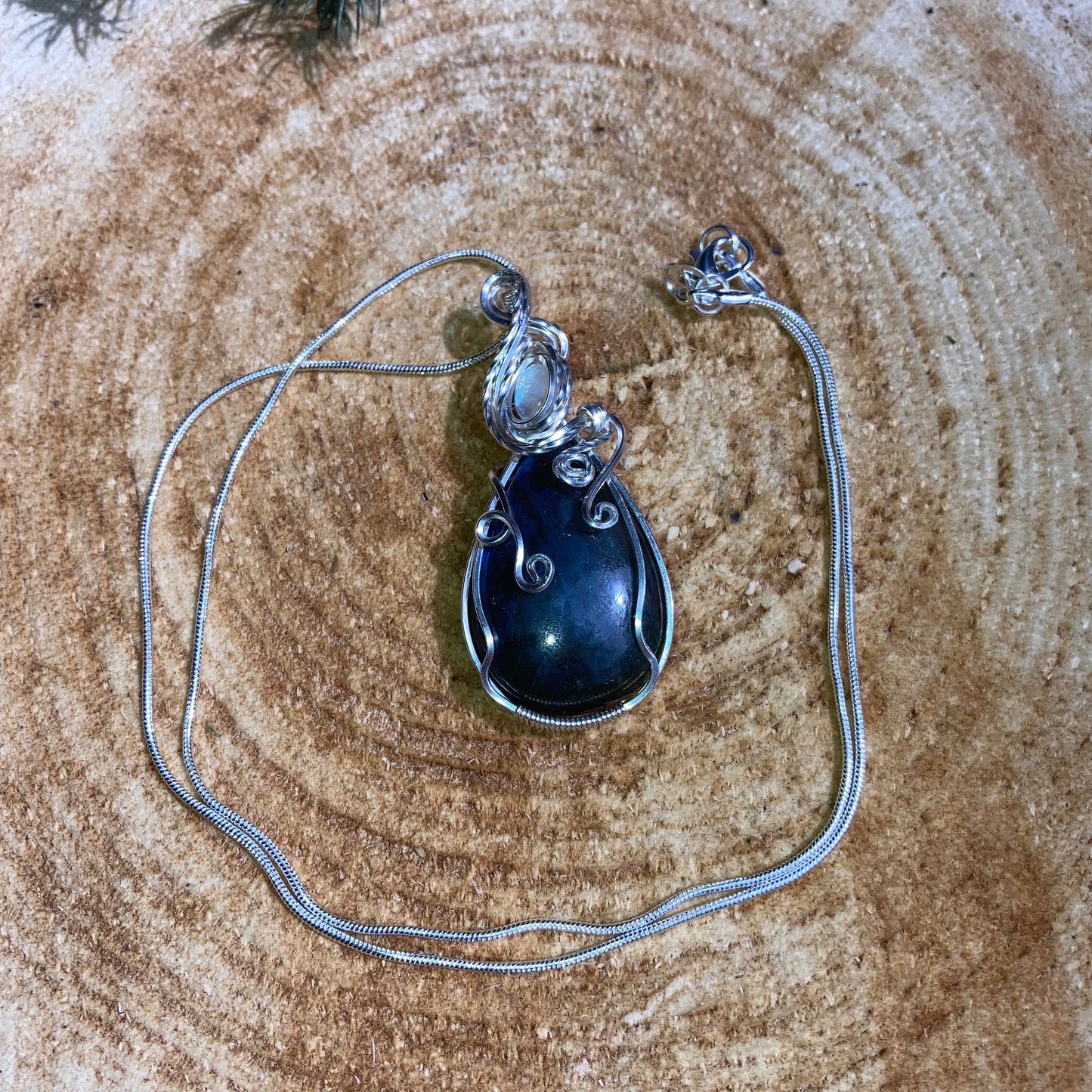 Blue flash Labradorite Rainbow Moonstone wrapped in 925 sterling silver on a 925 sterling silver chain